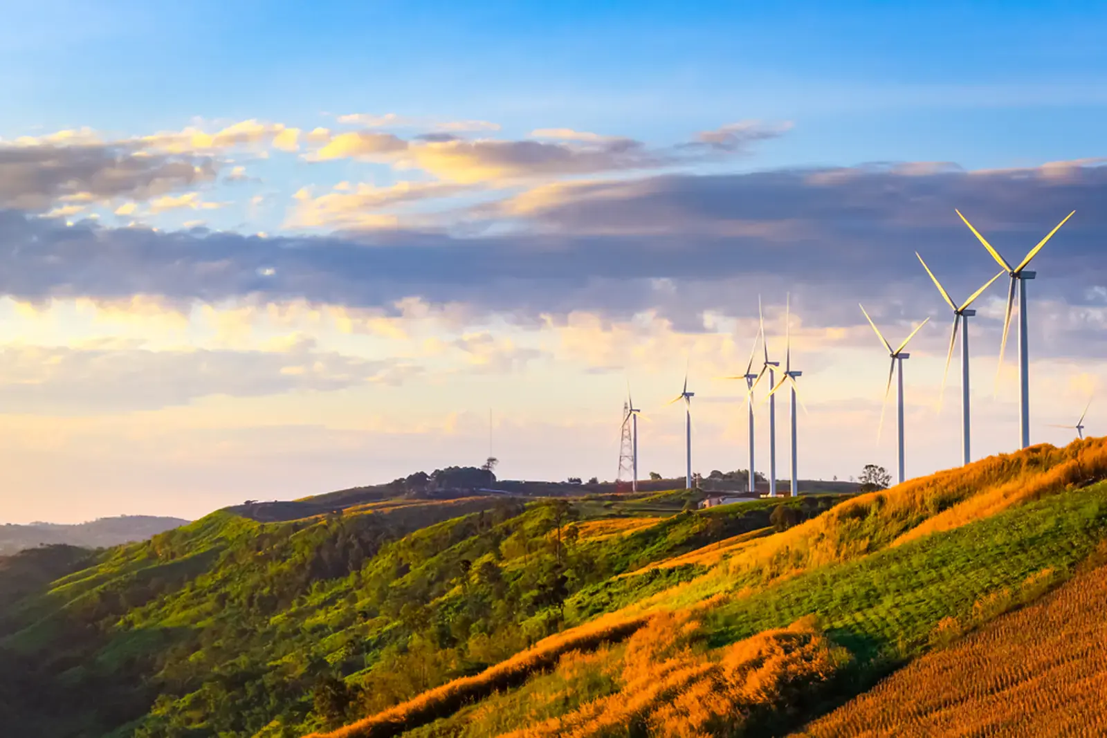 Khao Kho Wind Farm with turbines and sea of mist